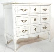 A 19th Century French white painted wood Louis XV style commode - chest of drawers having three