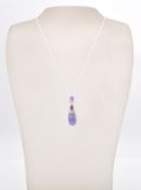 A stamped sterling silver amethyst and tourmaline pendant necklace with a .925 rope chain