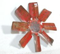 An unusual 20th Century retro vintage industrial painted cast metal turbine fan / propellor having