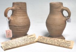 A pair of 15th century German Northern German Steinzeug - stein pottery tankards. Each of