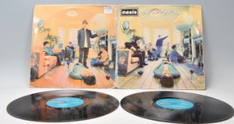 A vinyl long play LP record album by Oasis – Definitely Maybe – Original 1st U.K. Press 1994 – CRE