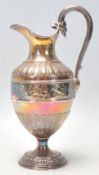 A silver hallmarked Elkington & Co Victorian neo classical ewer jug having a central band of