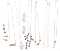 A group of silver jewellery to include a pearl necklace having a silver lobster claw clasp, a demi