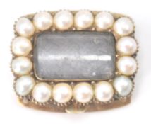 An antique Georgian 19th century pearl gold mourning bracelet clasp. The clasp set with woven hair