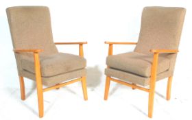 A pair of vintage retro mid 20th Century open arm chairs having wooden frames with brown upholstered