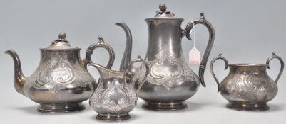 An early 20th Century good quality silver plate tea and coffee service having raised and engraved