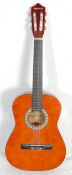 A vintage Elevation made six string acoustic guitar having inlaid geometric pattern decoration
