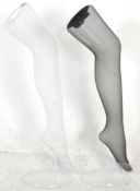 A pair of modern shop display / advertising plastic dummy legs for stockings / tights.  73cm high.