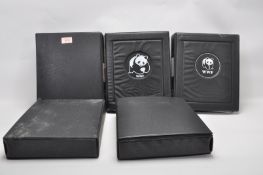 A group of five WWF stamp collectors albums filled with WWF special issue animals stamps, albums