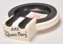 A vintage 1930s RMS Queen Mary Cunard White Star line ship bakelite advertising ashtray, having a