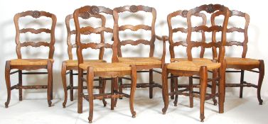 A set of 7 19th century Provincial French oak dining chairs. Provence Brittany, with sabre legs
