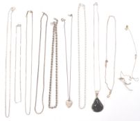 A group of silver necklace chains to include a fine link example having a heart locket pendant, rope