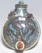 A vintage retro 20th century studio art pottery flask /keg of round moonflask form having a wooden