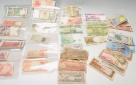 A collection of 20th Century bank notes to include South African Rand, Zambian Kwacha, Ethiopian