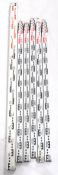 A collection of  six 20th century extending surveyors measures with metal fittings. Each with