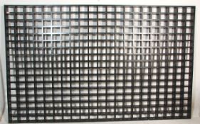 A vintage 20th Century ebonised wooden frame room divider / pierced wall constructed from jointed