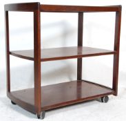 A retro mid century Danish inspired teak wood butlers / hostess trolley. The trolley with 3 tiers