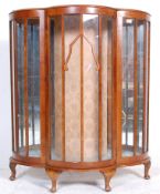 A 1930's Art Deco walnut veneered china display cabinet / vitrine. Raised on cabriole legs with