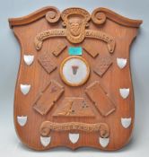 A vintage wooden wall  plaque British Brewood Cann