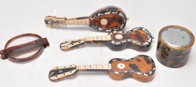 A group of antique tortoise shell ornaments to inc