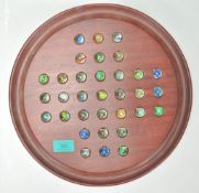 A 20th Century solitaire board game having a full