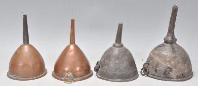 A group of four wine funnels dating from the 18th