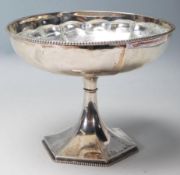 A 20th century antique 800 silver centrepiece tazza dish with gadrooned decoration motif to the base