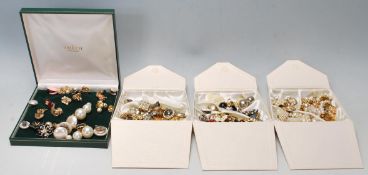 A collection of vintage retro ladies costume jewellery clip on earrings, over 60 pairs in total,