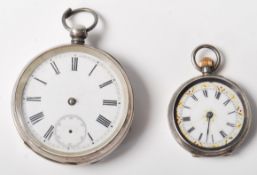 Two antique silver pocket watches to include one having engine turned decoration with a cartouche