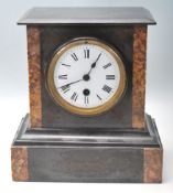 An Antique 20th Century Marble slate mantel clock having a flared top over a white enamel face and