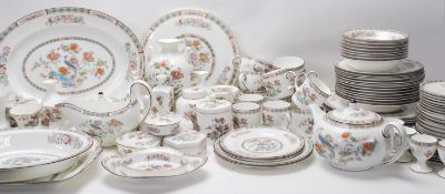 An extensive Wedgwood Kutani crane dinner and tea service consisting of dinner plates, side