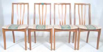 G-Plan Furniture - A set of four vintage retro G Plan teak wood dining chairs having floral padded