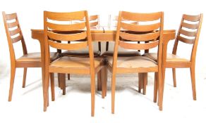 Nathan Furniture - British modern design. A mid century teak wood dining rooms suite comprising an