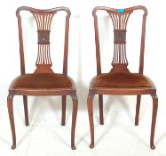 A pair of late 19th century Victorian Art Nouveau mahogany dining chairs / hall chairs having padded
