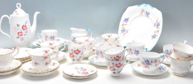 A selection of Royal Albert English bone china tea sets to include Rose Time pattern tea cups,