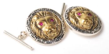 A pair of hallmarked sterling silver two tone cufflinks featuring the iconic Versace style lions