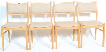 A set of vintage retro 20th Century German made beech wood framed dining chairs having square