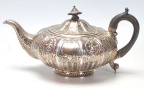 A 19th Century William IV silver hallmarked John, Henry & Charles Lias tea pot having a sectional