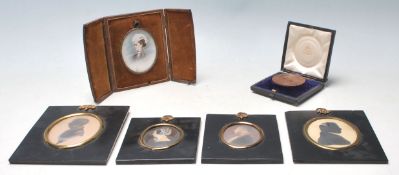 A selection of 19th Century Victorian silhouettes and portraits all related to the same family to