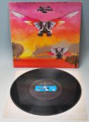 A vinyl long play LP record album by Osibisa – First Album – Original MCA Blue and Black label U.