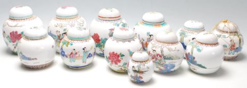 A collection of 20th Century Chinese republic period ginger jars decorated with famille rose