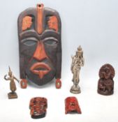 A collection of oriental religions figurine to include Chinese Wise Man, brass Thai Teppanom