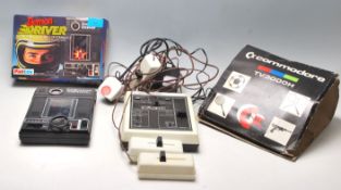 A vintage retro Demon Driver Auto Raceway by Palitoy in original box together with a Commodore T.V.