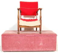 An early 20th Century oak velvet upholstered end of bed ottoman /  blanket box having a hinged top