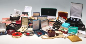 A quantity of retro vintage costume jewellery including necklaces, bracelets, earrings, rings and