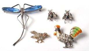 A group of five vintage brooches in the form of animals to include a cockerel brooch set with