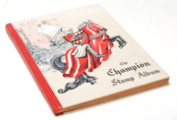 A collection of world stamps housed within a vintage stamp album to include early and Century