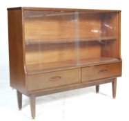 Jentique Furniture. A vintage retro 20th Century teak wood display cabinet / bookcase having a