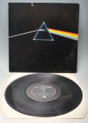 A vinyl long play LP record album by Pink Floyd – Dark Side Of The Moon – Original EMI Harvest U.S.A