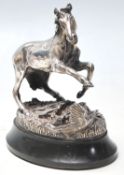 A hallmarked Sterling Silver figurine of a horse being startled by a bird set on a naturalistic